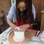 Cake Decorating Course Birmingham - Placing Flowers on a Cake