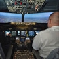 737-800 Jet Airliner Flight Simulator - Pilot at Simulator Controls